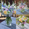 A seasonal fresh flower arrangement with premium blooms in soft pastel color