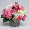 &quot;So Sweet&quot; is a charming floral arrangement featuring soft white hydrangeas paired