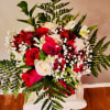The perfect blended red and white rose hand held bouquet