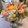 Your vase arrangement will be created in a similar styling of pastel