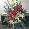 Standing tall, proud and patriotic, this dazzling free-standing spray is like a