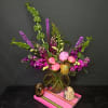 Indulge in the ultimate luxury with our Opulent Jewel-Toned Flower Arrangement. This