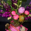 Indulge in the ultimate luxury with our Opulent Jewel-Toned Flower Arrangement. This