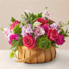 Inspired by bright shades and soft textures, this arrangement will wow your