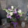 A assortment of white Snapdragon, lavender stock, alstroemeria, lisianthus roses, , 