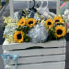 Baby basket incluyes Flowers and baby clouthes