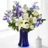 Accented by a deep blue vase, our Calming Comfort Bouquet is crafted