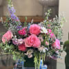 Flowers: queen mayra garden roses, helleborous, purple larkspur, green amaranthus, pittosporum greenery