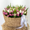 Brighten someone&rsquo;s day with our Pastel Petal Basket. Beautiful tulips, hand-arranged in