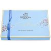Open this beautiful box tied with a blue ribbon and indulge in