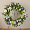 Memorial wreath available in white/green or seasonal pastel. 