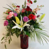 A large All Around bouquet filled with Garden Roses, Standard Roses, Oriental
