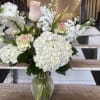 Let this uplifting arrangement be reminders of the clear skies ahead. Capturing