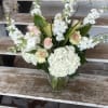 Let this uplifting arrangement be reminders of the clear skies ahead. Capturing