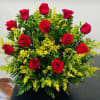 12 Red roses with Solidigo in a Basket  