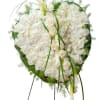 A combination of cream and white blooms in this 22" heart creates