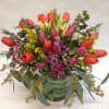This arrangement comes complete with 20 fresh tulips, accompanied by a mixture