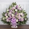 The purple and white flower sympathy floor basket is a wonderful gift