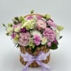 A charming mini basket filled with a carefully selected mix of fresh