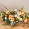 A nature inspired piece, perfect as a casket spray or memorial backdrop.