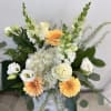 Experience the essence of elegance with the Pure Love flower arrangement by