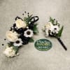The Classy Combo by Savilles Florist features a corsage with 3 white