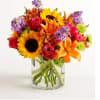 Like a warm embrace, our vibrant bouquet delivers your sentiments to someone
