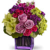 A beautiful combination of purple, green and hot pink flowers makes this