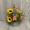 Bight color arrangement with a metal squirrel pick. Three container colors available