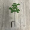 Cute turtle arrangement in a wooden box with a metal turtle pick