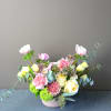 Our designers will select the most beautiful, seasonal blooms and greenery in