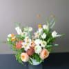 Our designers will select the most beautiful, seasonal blooms and greenery in