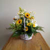 This Sunflower basket with white and yellow daises and sunflowers, is the