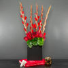 This stunning, long lasting arrangement is made of gorgeous gladiolus, and roses