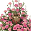 This arrangement has pink roses, pink carnations, spiral eucalyptus and beautiful greenery.