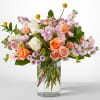 Serene and fragrant, this arrangement blends soft pastels to create a gift