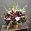 A large arrangement created with premium blooms examples include : roses,lilies, hydrangea