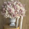 An exquisite dome of soft romance, Blush Embrace is a refined composition