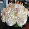 This bouquet shows that there is beauty in simplicity. This elegant arrangement