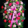 pink alstroemeria &amp; carnations alongside a splash of red carnations