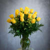 Vase With A Beautiful Yellow Roses