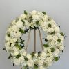 In a solemn tribute to a life cherished and remembered, this elegant