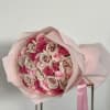 This enchanting bouquet features a harmonious blend of light pink, hot pink