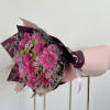 Delicate lavender garden roses, their petals soft and inviting, intertwining with vibrant