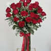 Timeless and elegant, this vase of stunning red roses is the perfect