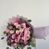 This exquisite bouquet captures the essence of romance and elegance with a