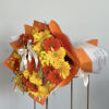 A vibrant bouquet that radiates warmth and joy, featuring a delightful mix