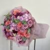 Introducing our enchanting Purple Passion Bouquet, an exquisite arrangement featuring velvety purple