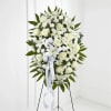 The Exquisite Tribute Standing Spray is an elegant display of sweet serenity.