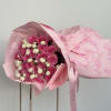 This beautiful bouquet of pink roses and white spray roses is a
